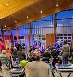 Community gathering at an indoor evening event